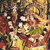 Sri Sri Radha Natabara in pink, green, and yellow