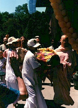 Lord Jaganatha being carried into the temple